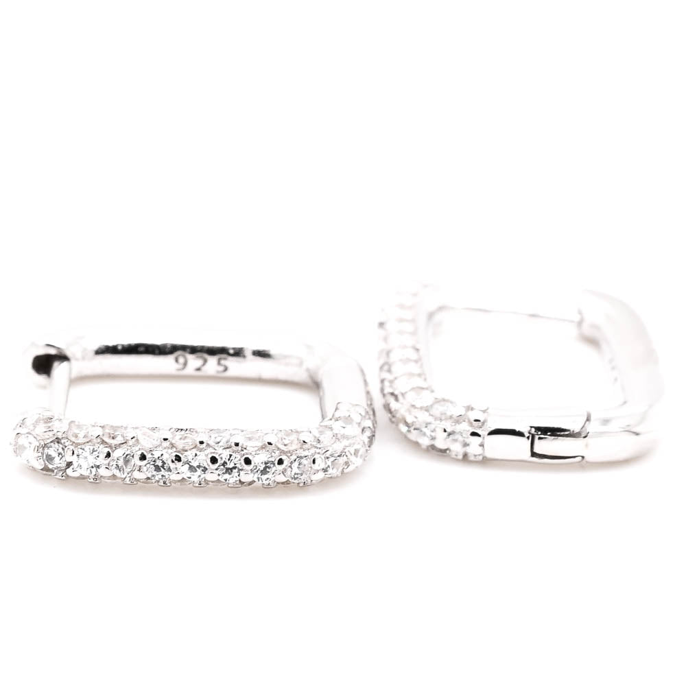 Sterling Silver C.Z Huggies Earrings.