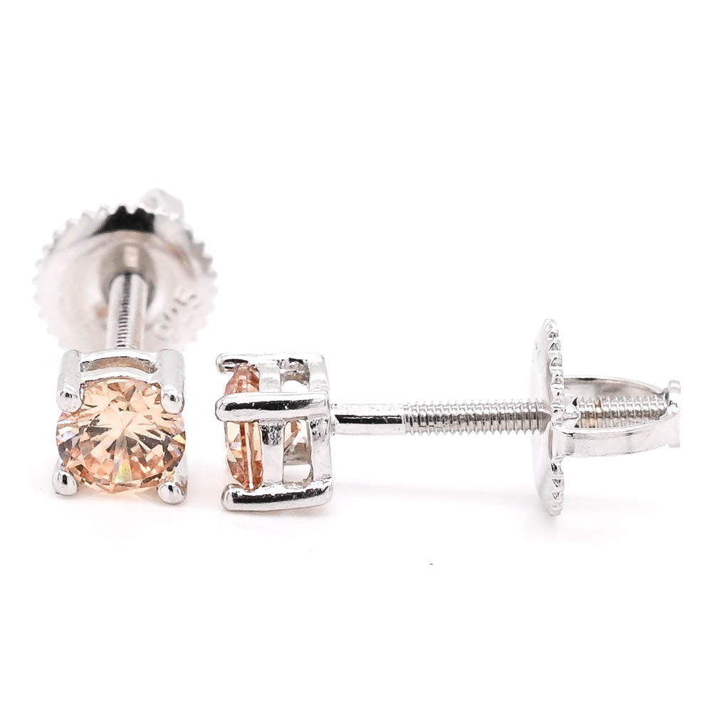 Sterling Silver 4mm Yellow C.Z Stud Earrings.