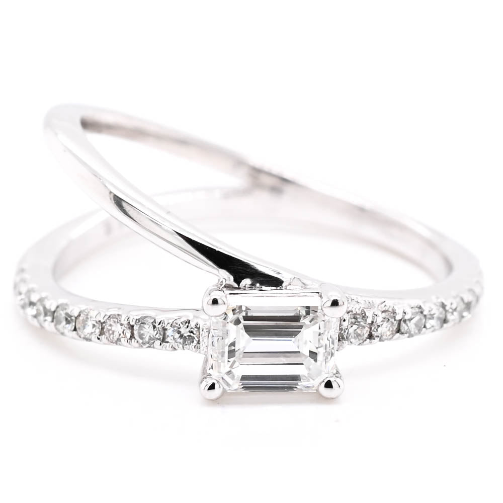 14KT White Gold 0.71CTW Emerald Shape Canadian Diamond Ring.