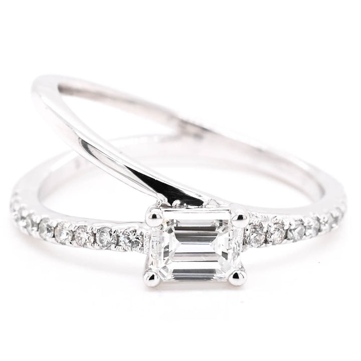 14KT White Gold 0.71CTW Emerald Shape Canadian Diamond Ring.