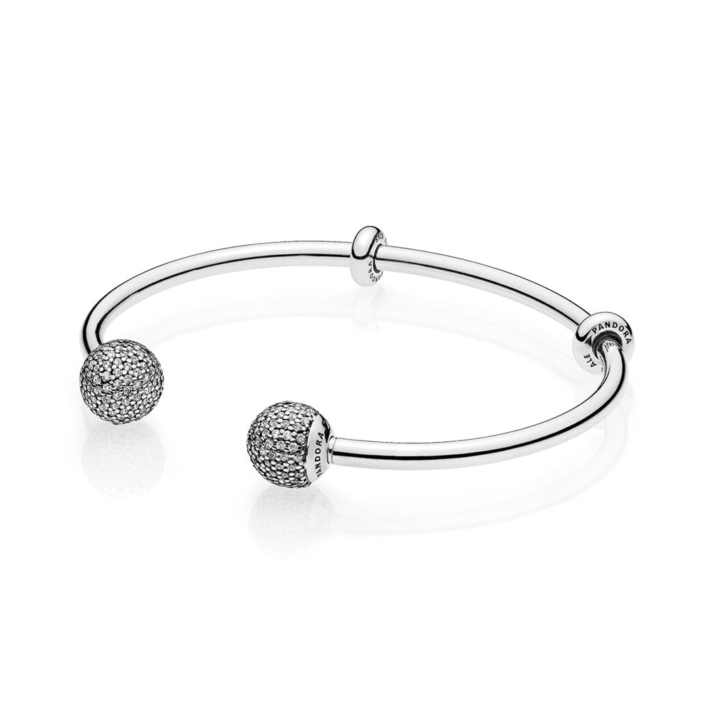 Silver open bangle with interchangeable end caps with clear cubiz zico