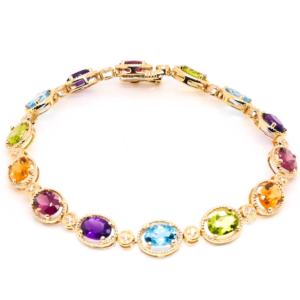 10KT Yellow Gold 8" Peridot, Blue Topaz, Amethyst, Rhodolite Garnet, Citrine & Diamond Bracelet.