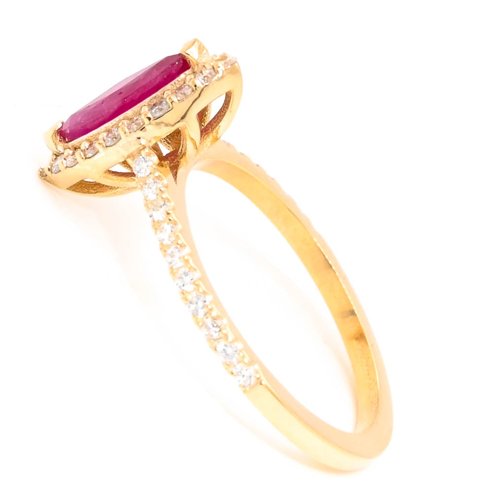 14KT Yellow Gold 0.55CT Marquise shaped Ruby & Diamond Halo Set Ring.
