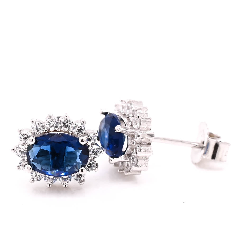Sterling silver Oval Blue C.Z Halo Set Stud Earrings.
