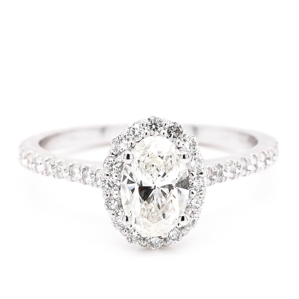 14KT White Gold 1.05CTW Oval Shape Diamond Halo Set Engagement Ring.