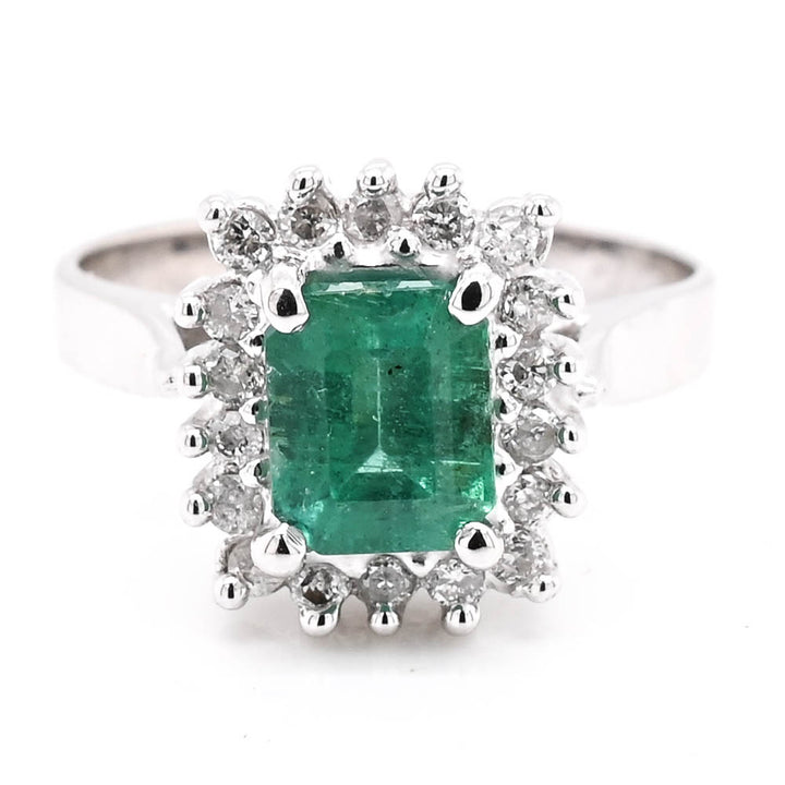 14KT White Gold 1.43CT Emerald & Diamond Cluster Ring.