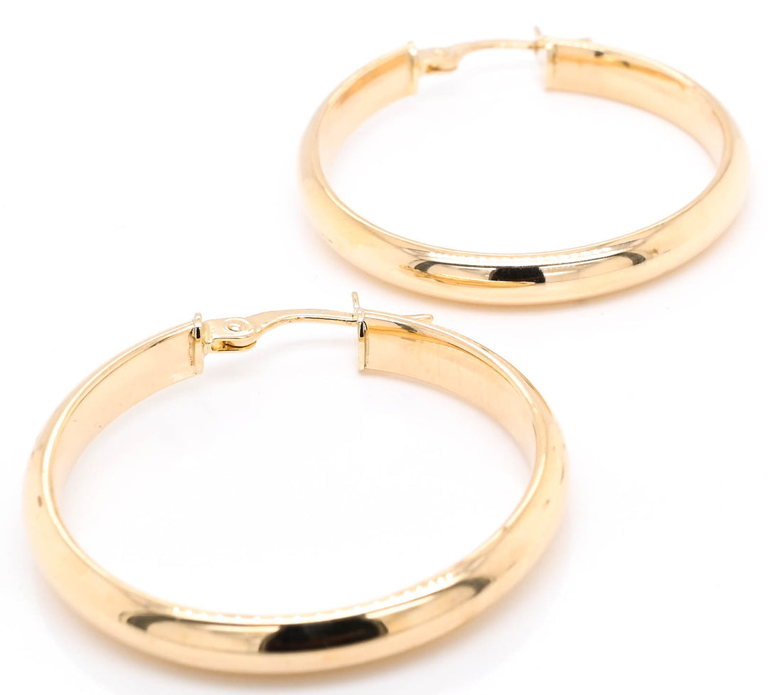 10KT Yellow Gold Medium Hoop Earrings.