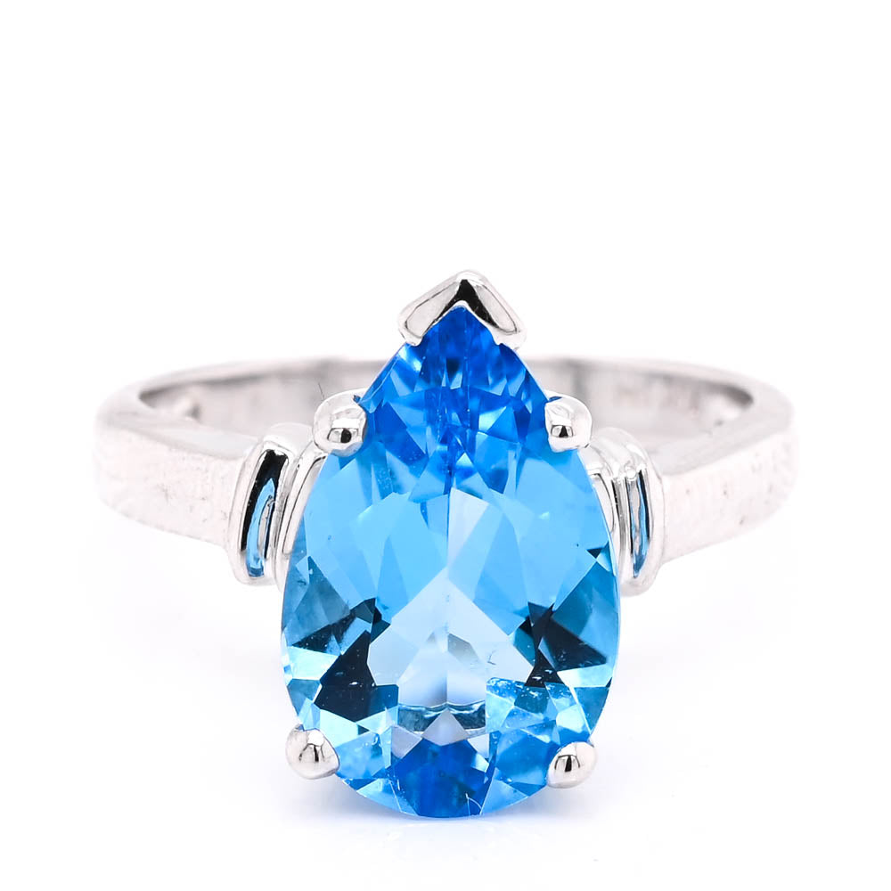 14KT White Gold Pear Shape Blue Topaz Solitaire Ring.