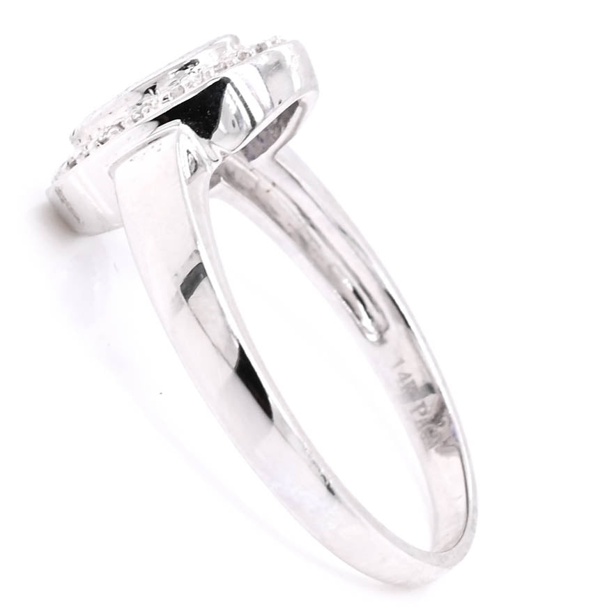 14KT White Gold val Shape Tanzanite & Diamond Ring.