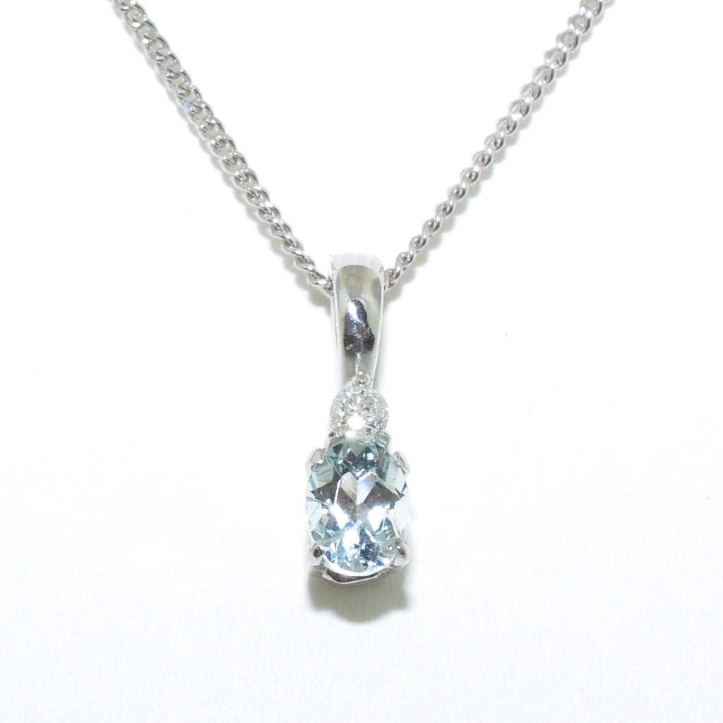 10KT White Gold 18" Aquamarine and Diamond Necklace.