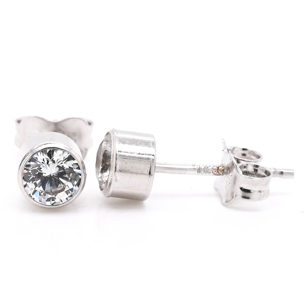 10Kt White Gold 4MM C.Z Bezel Set Stud Earrings.