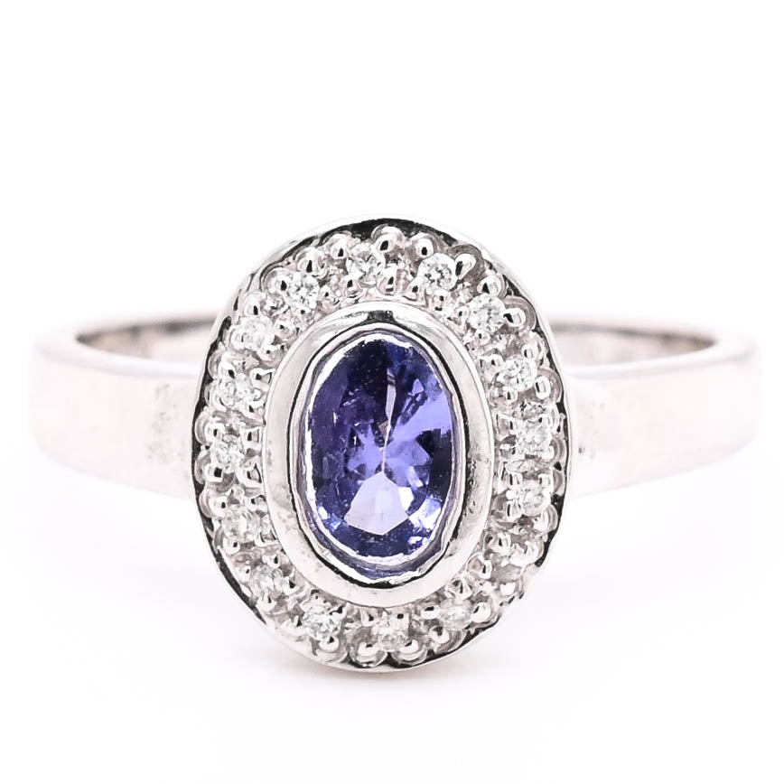 14KT White Gold val Shape Tanzanite & Diamond Ring.