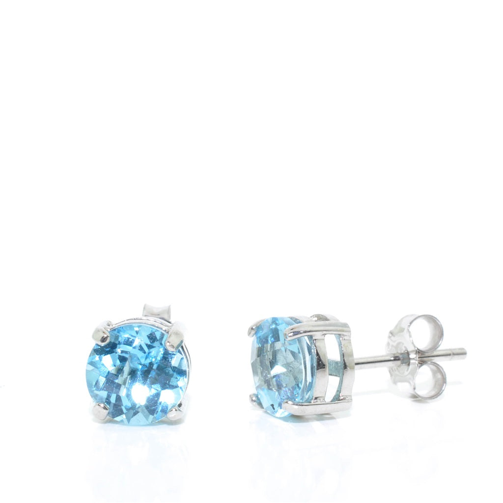 14KT White Gold Blue Topaz Stud Earrings.