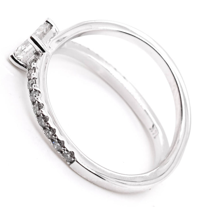 14KT White Gold 0.71CTW Emerald Shape Canadian Diamond Ring.