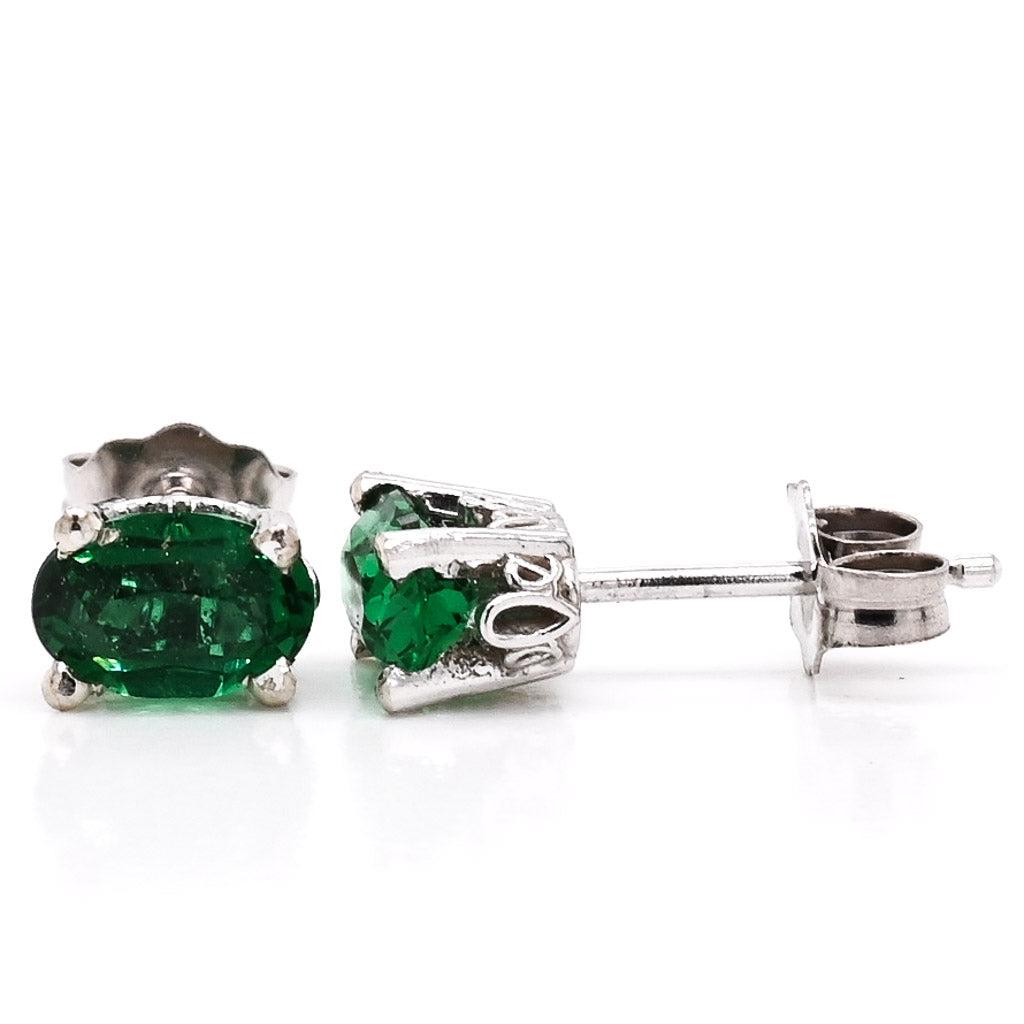 14KT White Gold 6x4mm Oval Shape Green Simulated Emerald Earrings.