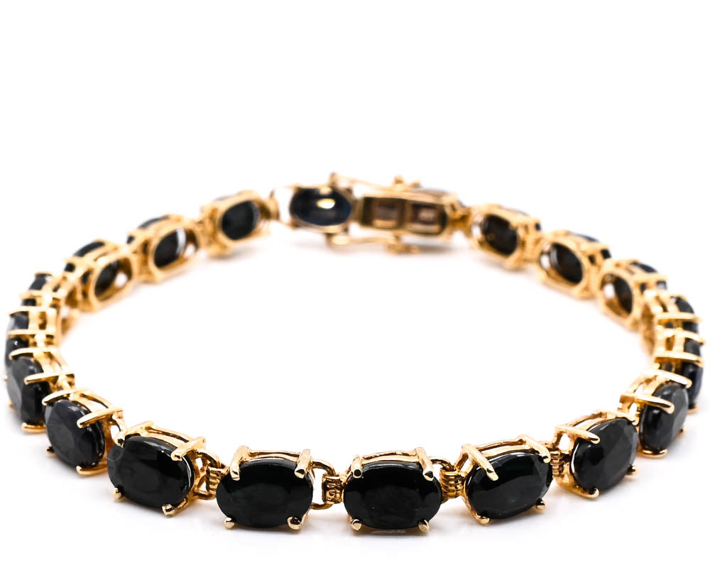 10KT Yellow Gold 7.5" Blue Sapphire Tennis Bracelet.