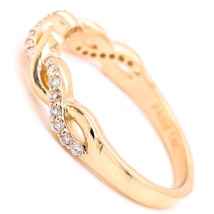 14KT Yellow Gold 0.18CTW Diamond Infinity Ring.