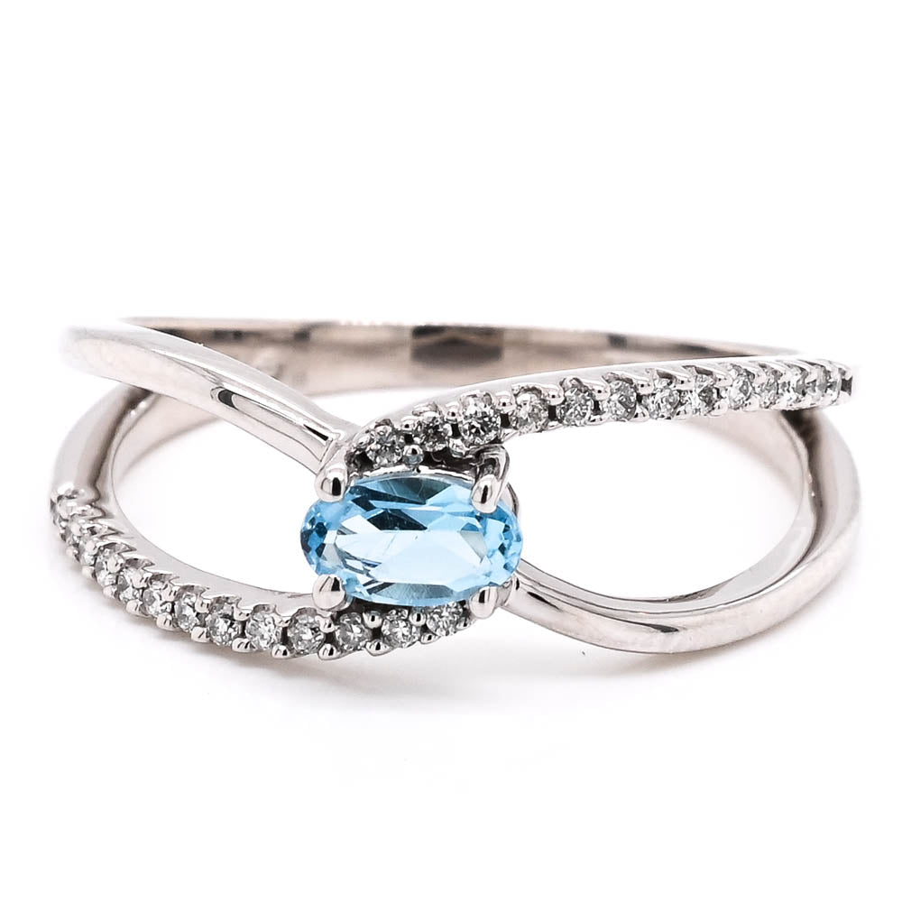 10KT White Gold Blue Topaz & Diamond Ring.