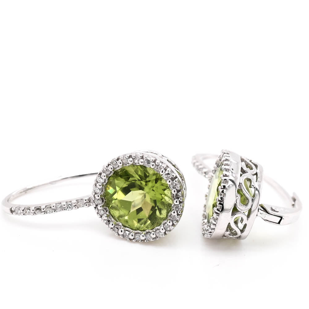 14KT White Gold Peridot and Diamond Halo Set Lever Back Earrings.