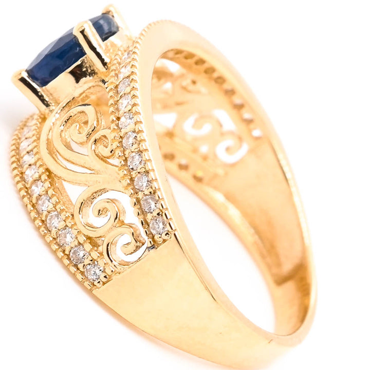 14KT Yellow Gold 0.80CT Round Brilliant Blue Sapphire & Diamond Ring.