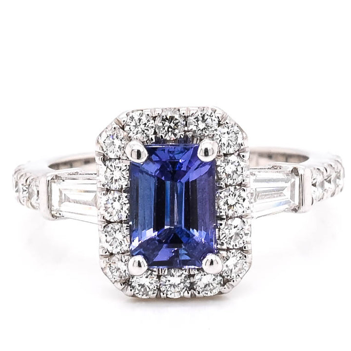 14KT White Gold 1.00CT Emerald Shape Tanzanite & Diamond Halo Set Ring.