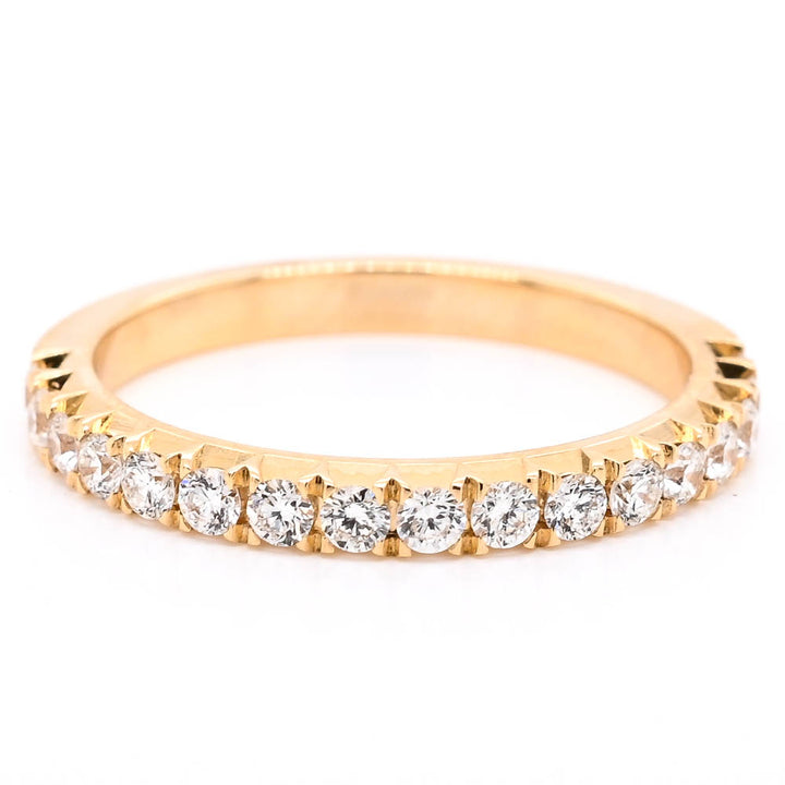 14KT Yellow Gold 0.43CTW Diamond Wedding Band. 
Band Width: 2mm
Si