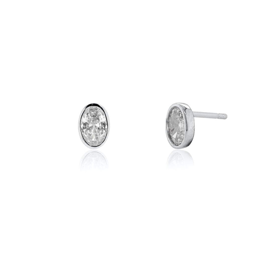 Sterling Siver Bevel Set CZ Oval Stud Earrings.