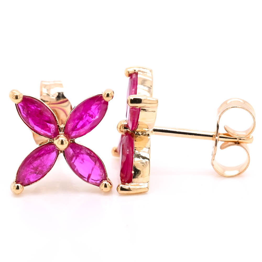 14KT White Gold Ruby Flower Stud Earrings.