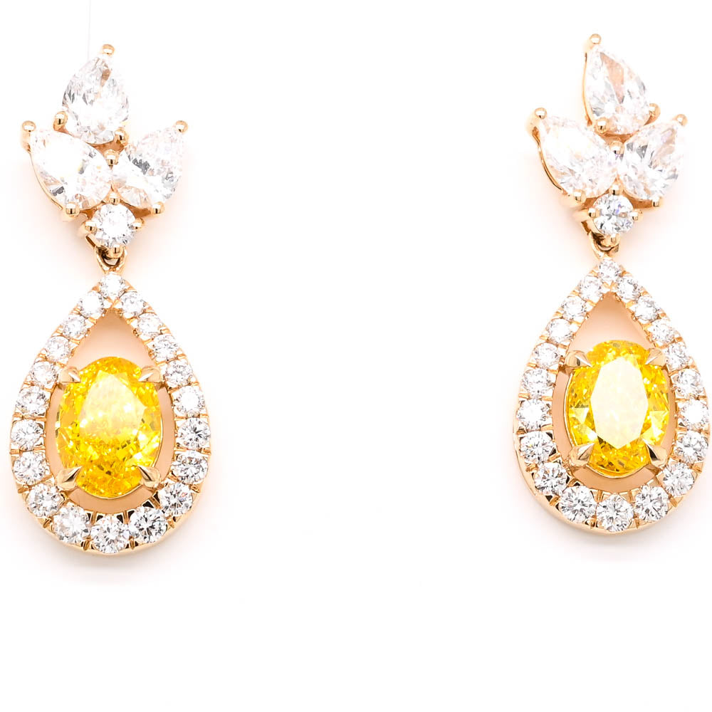 14KT Yellow 6.50CTW Oval Lab Grown Yellow Diamond Halo Set Drop Earrings.