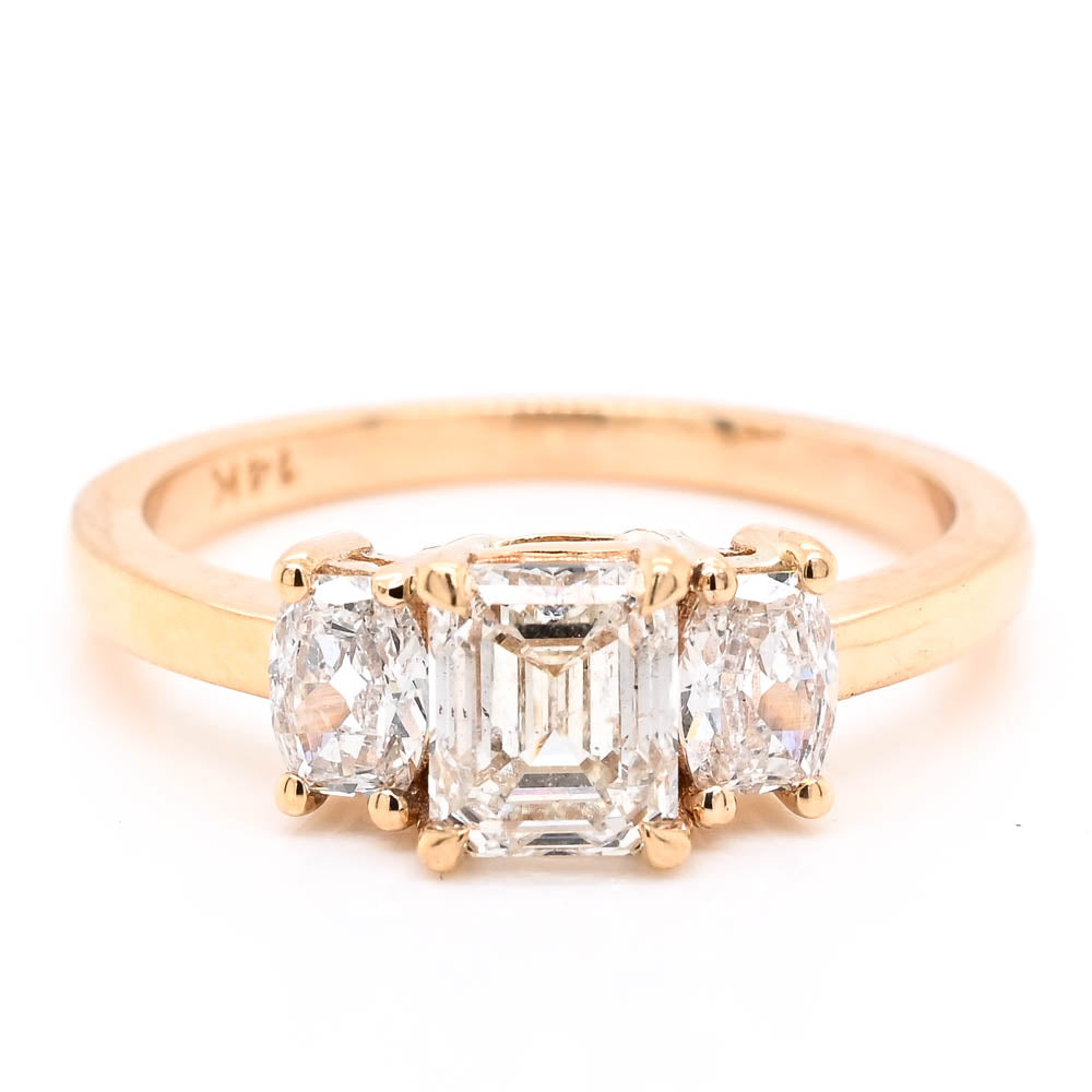 14KT Yellow Gold 1.53CTW Emerald Shape 3 Stone Diamond Engagement Ring.