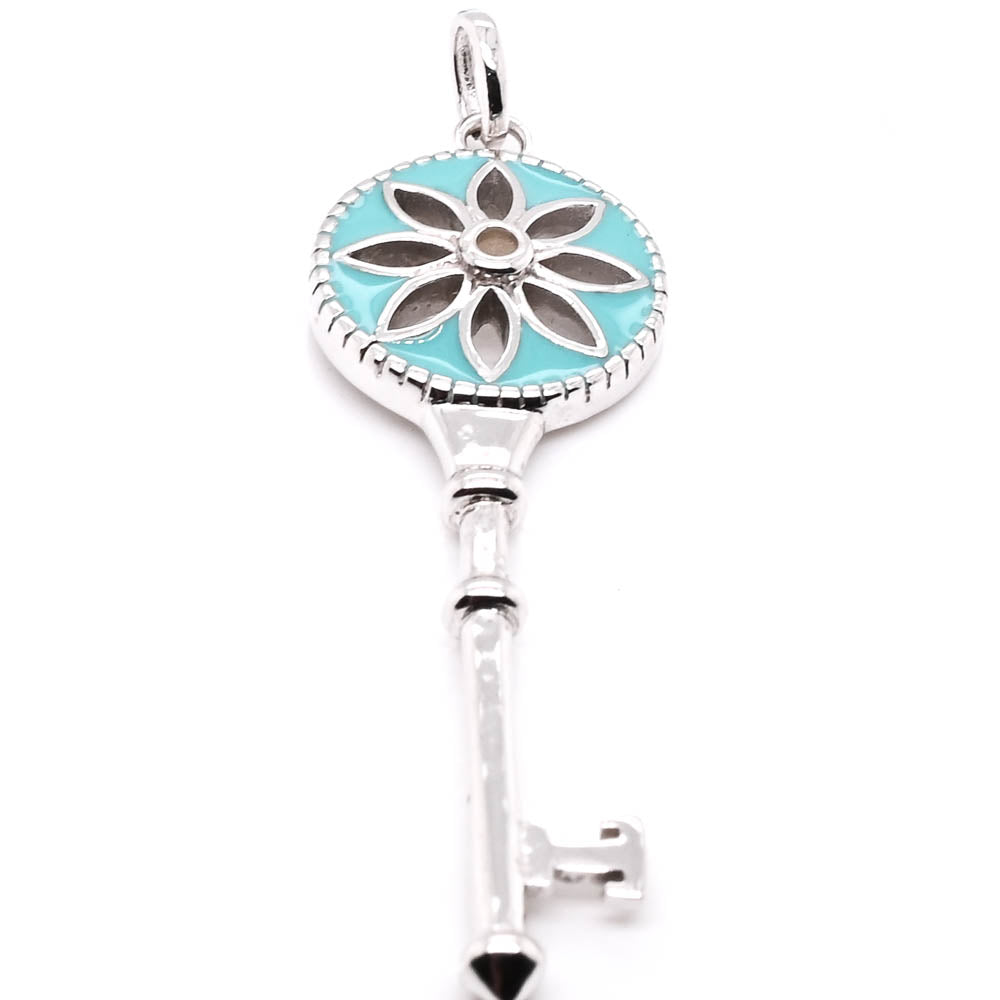 Sterling Silver Plain Key with Hollow Turquoise Flower Pendant.