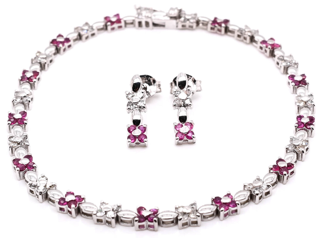 14KT White Gold 7" 1.40CTW Ruby & Diamond Floral Design Bracelet and Stud Earring Set.