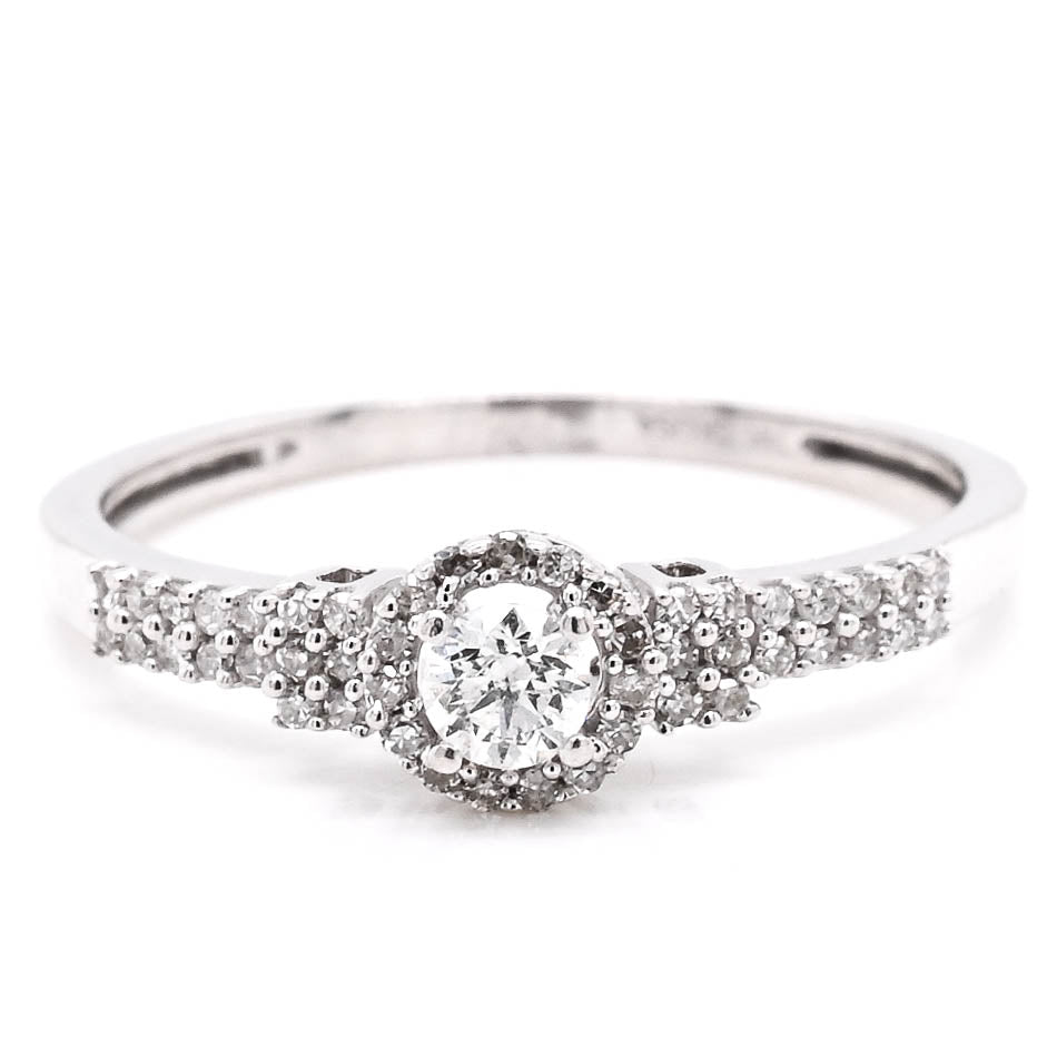 14KT White Gold 0.20CTW Diamond Ring.