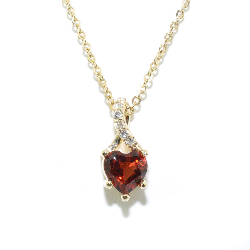 10KT Yellow Gold 18" Heart Shaped Garnet and Diamond Necklace.
