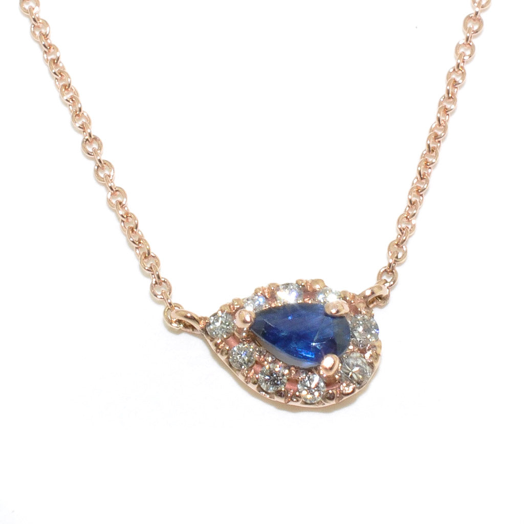 14KT Rose Gold 0.19CT Blue Sapphire and Diamond Pendant on 10KT Rose Gold 18" Rolo Chain.
