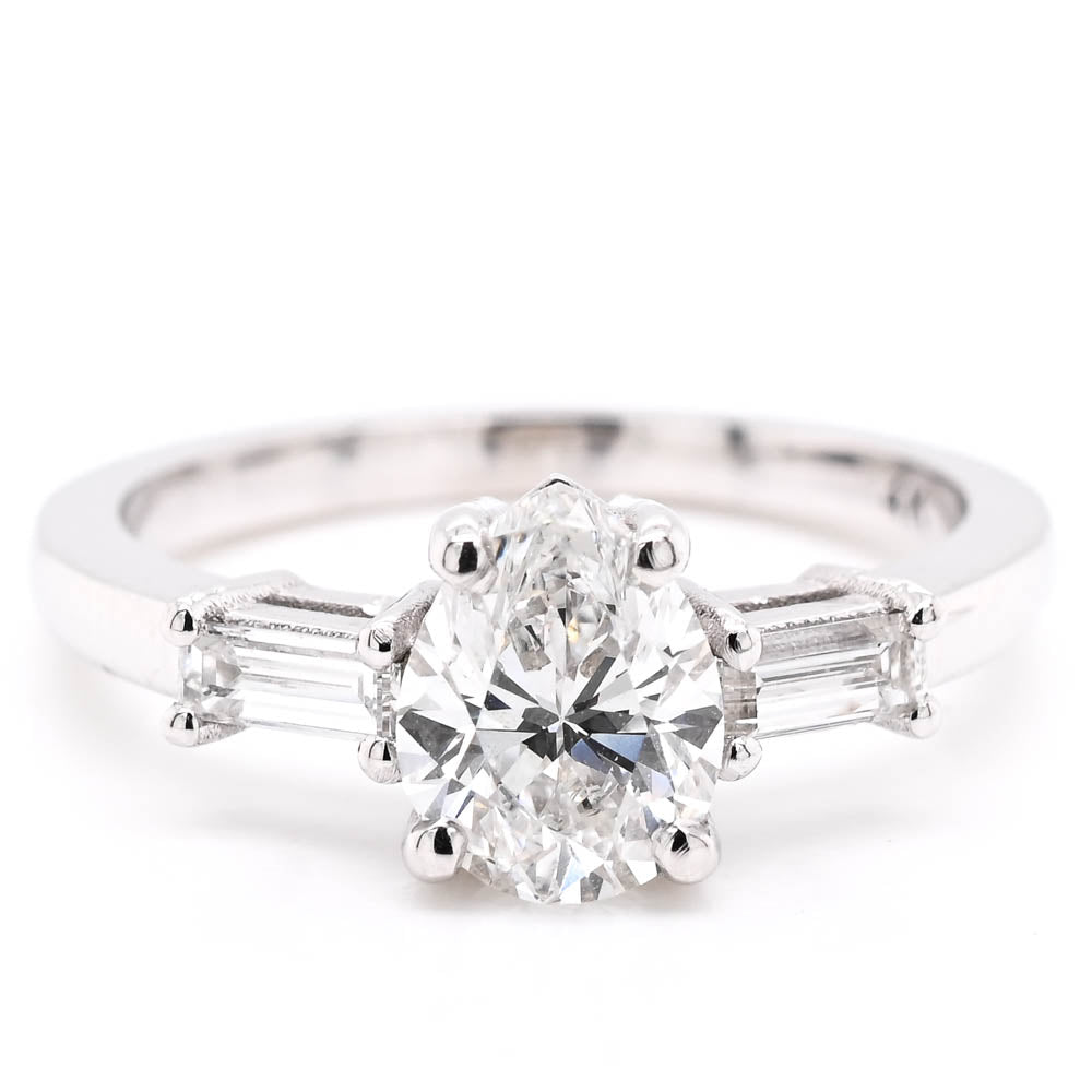 14KT White Gold 1.23CTW Pear Shape Diamond 3 Stone Engagement Ring.
