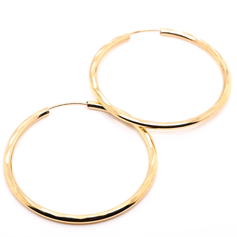 10KT Yellow Gold 28mm Sleeper Earrings.