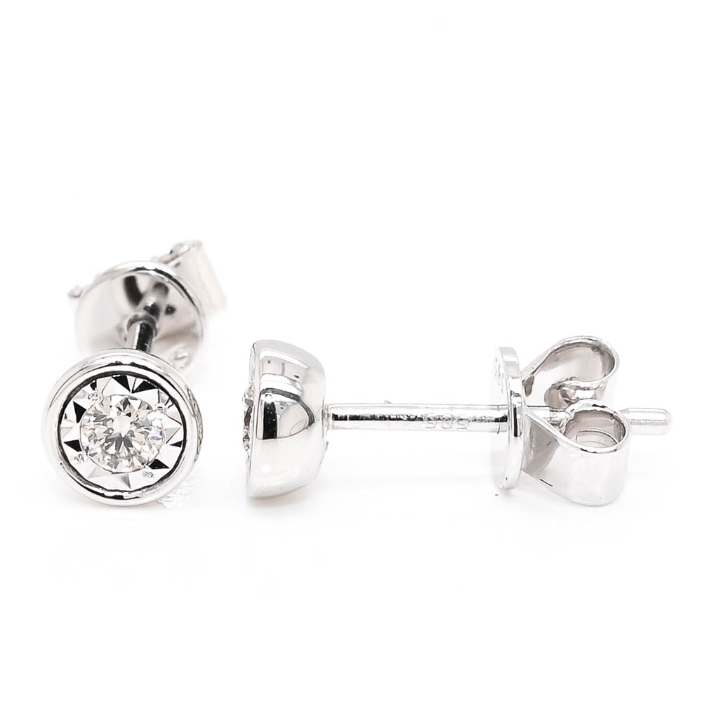 14KT White Gold 0.14CTW Diamond Bezel Set Earrings.