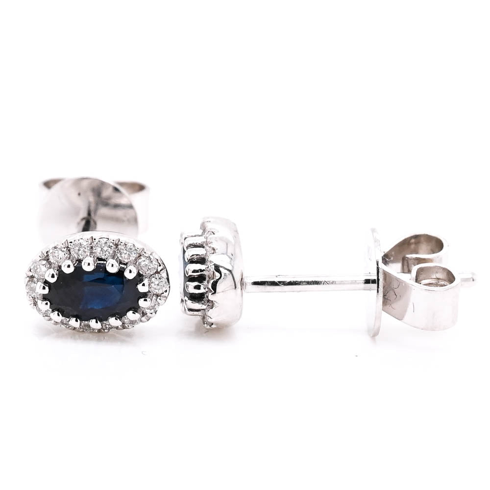 14KT White Gold 0.71CTW Blue Sapphire & Diamond Halo Set Earrings.