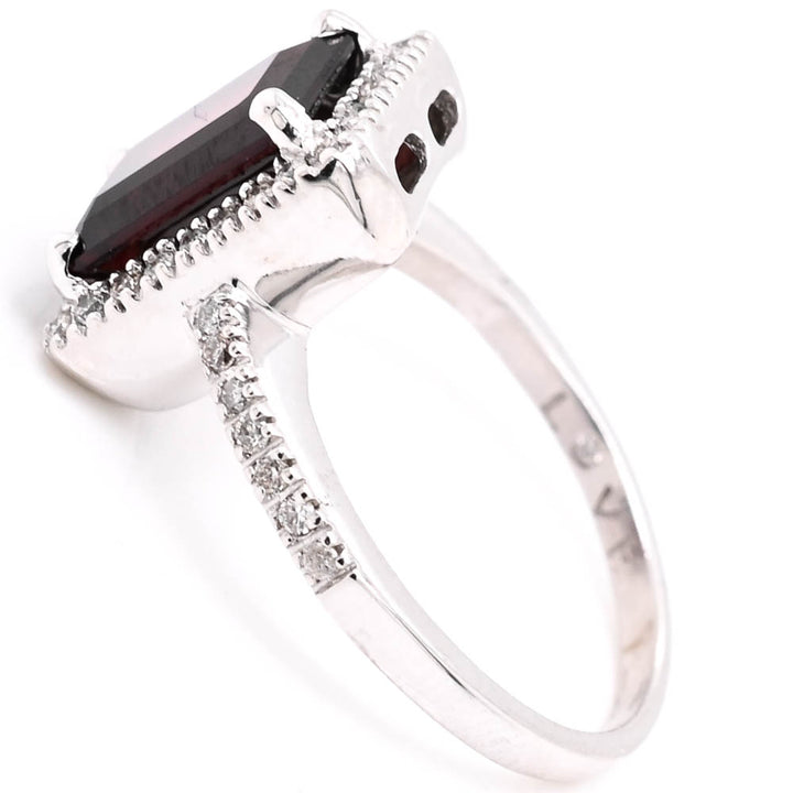 14KT White Gold Emerald Shape Garnet & Diamond Halo Set Ring. 
Band