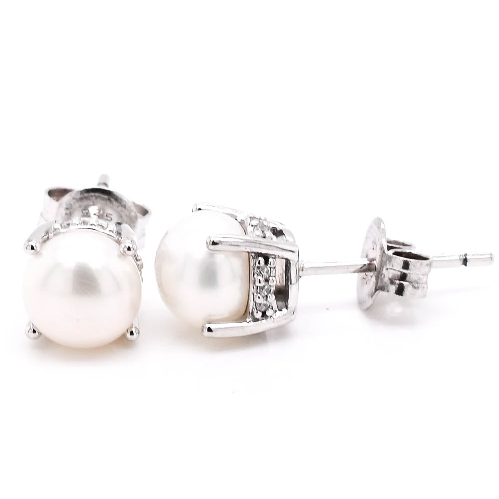 Sterling Silver 6.5-7mm Freshwater Water Pearl and C.Z Stud Earrings.