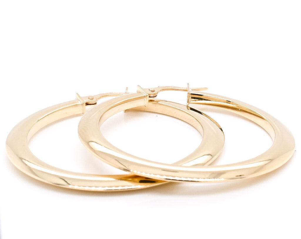 10KT Yellow Gold Flat Medium Hoop Earrings.