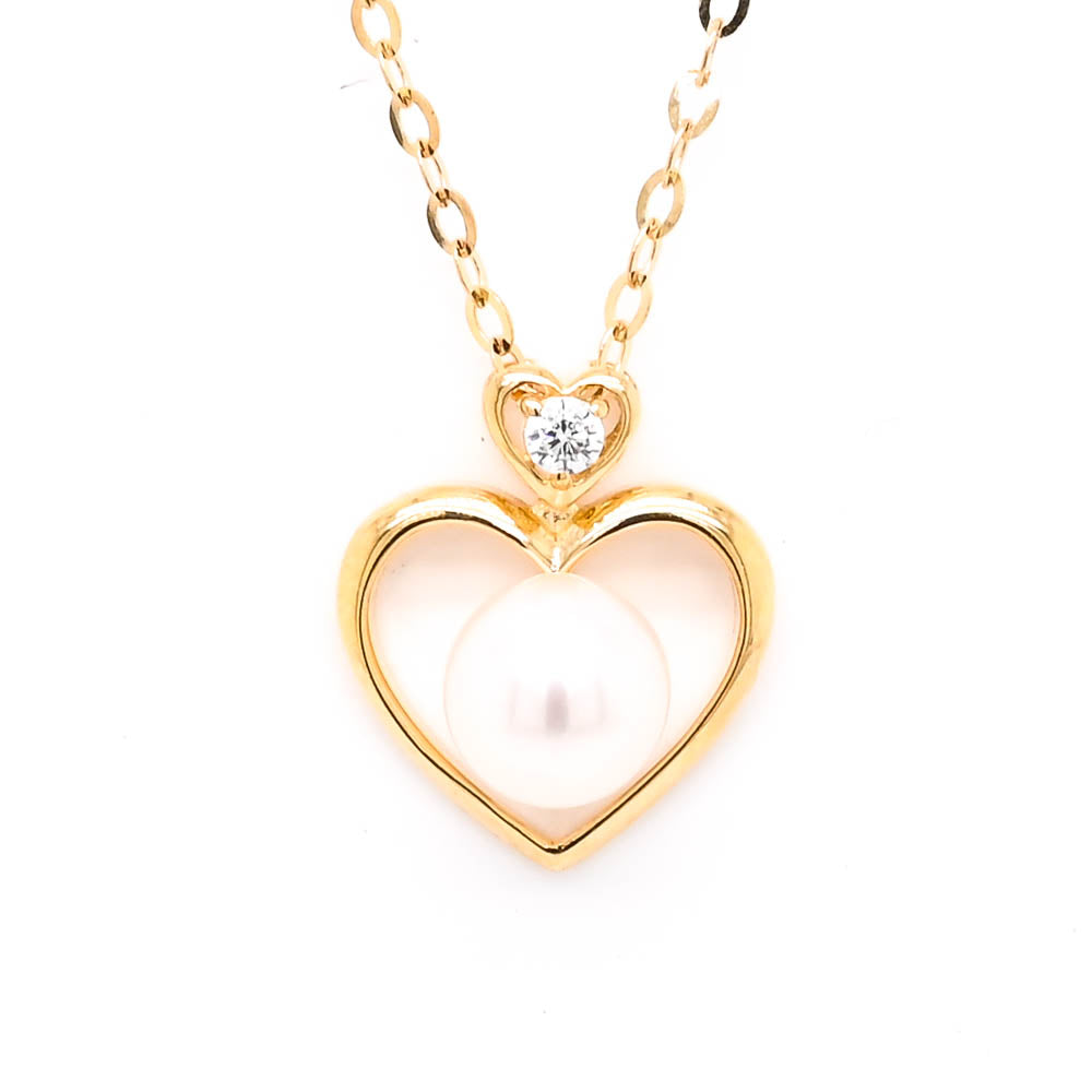 10KT Yellow Gold 18" 4mm Freshwater Peal & C.Z Heart Necklace.