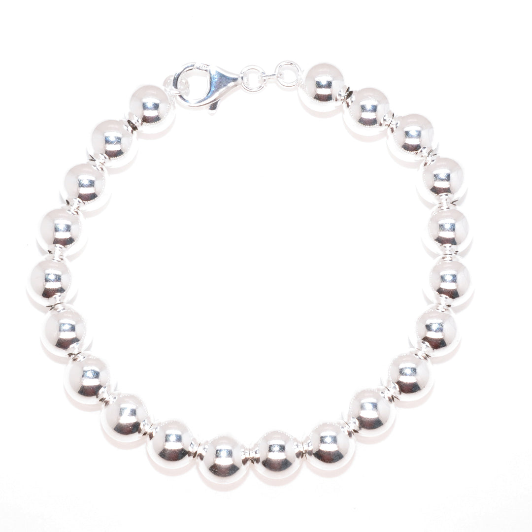 Sterling Silver 8" 8MM Bead Bracelet.