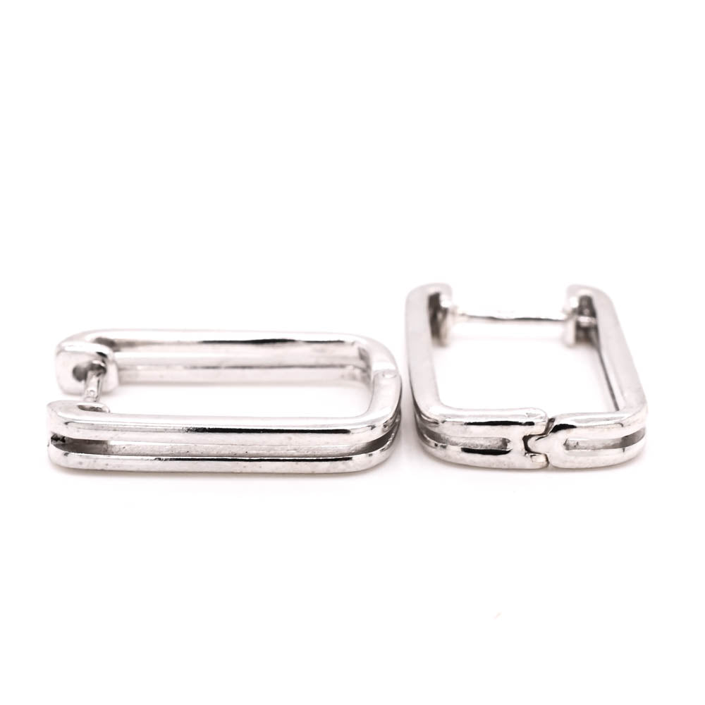 Sterling Silver C.Z Huggies Earrings.