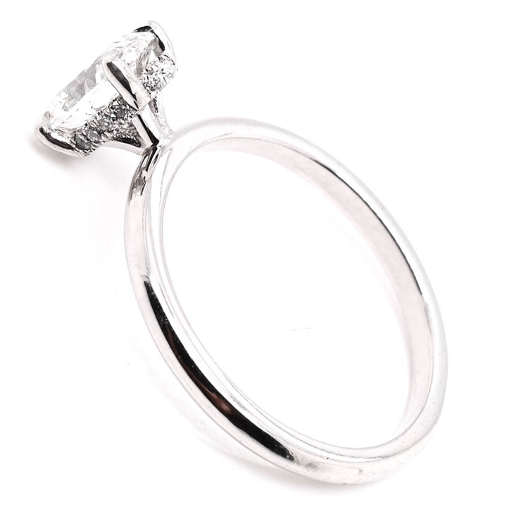 Graziella 14KT White Gold 1.07CTW Oval Shape Hidden Halo Engagement Ring.