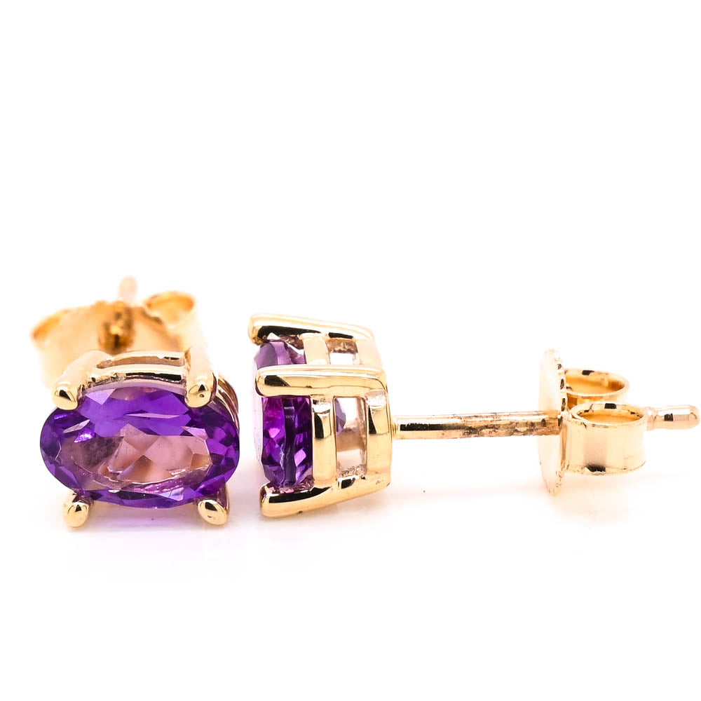 10KT Yellow Gold 1.00CTW Oval Shape Amethyst Stud Earrings.
