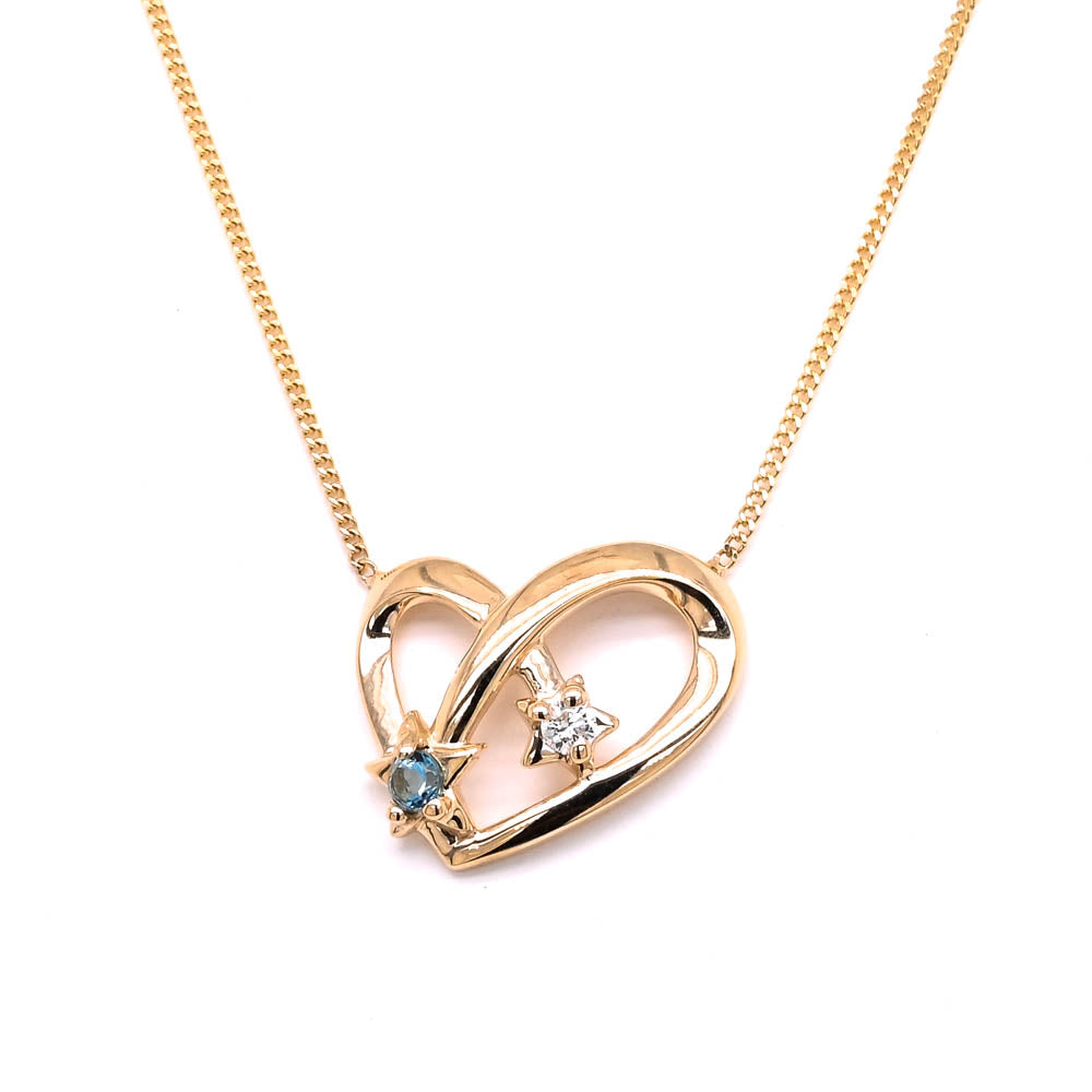 Fire &amp; Ice 10KT Yellow Gold 18" Blue Topaz &amp; Canadian Diamond Heart Necklace.