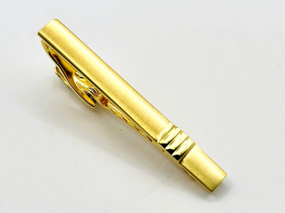 Weber stainless Steel Gold Tone Tie Bar.