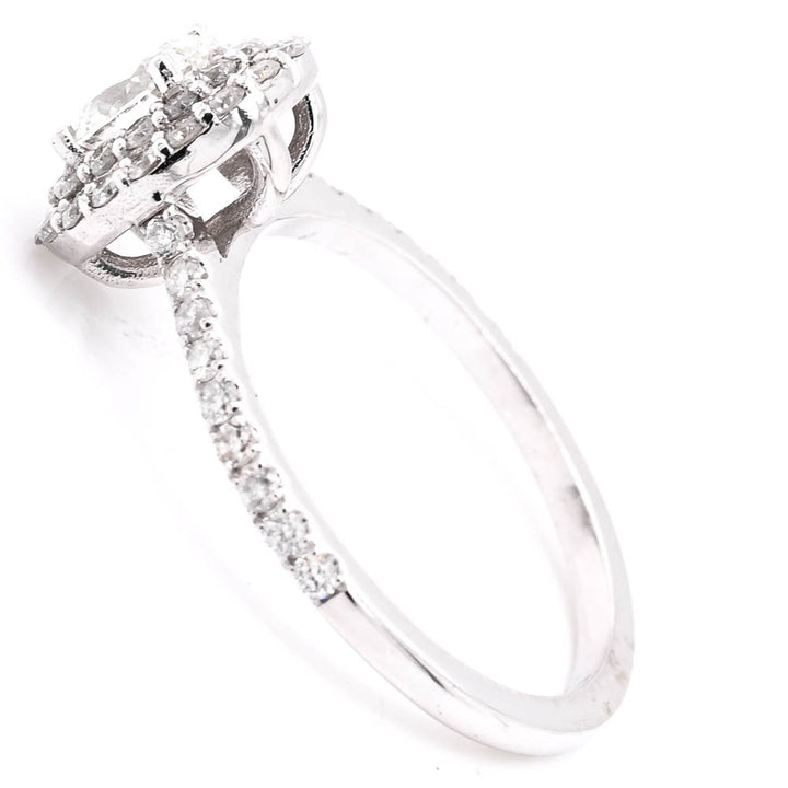 14KT White Gold 1.00CTW Oval Shape Diamond Double Halo Set Engagement Ring.